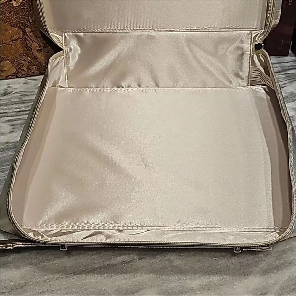 Lancôme   travel cosmetic gold bag